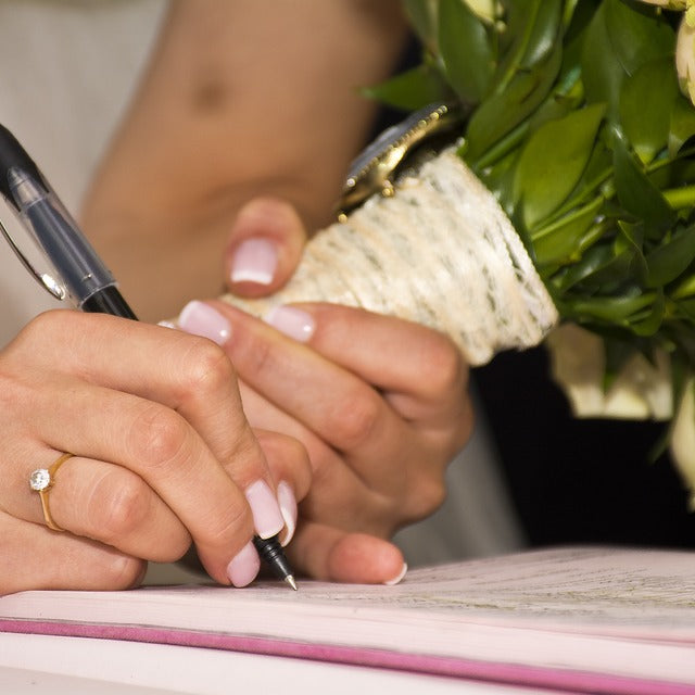 Signing a Marriage Certificate