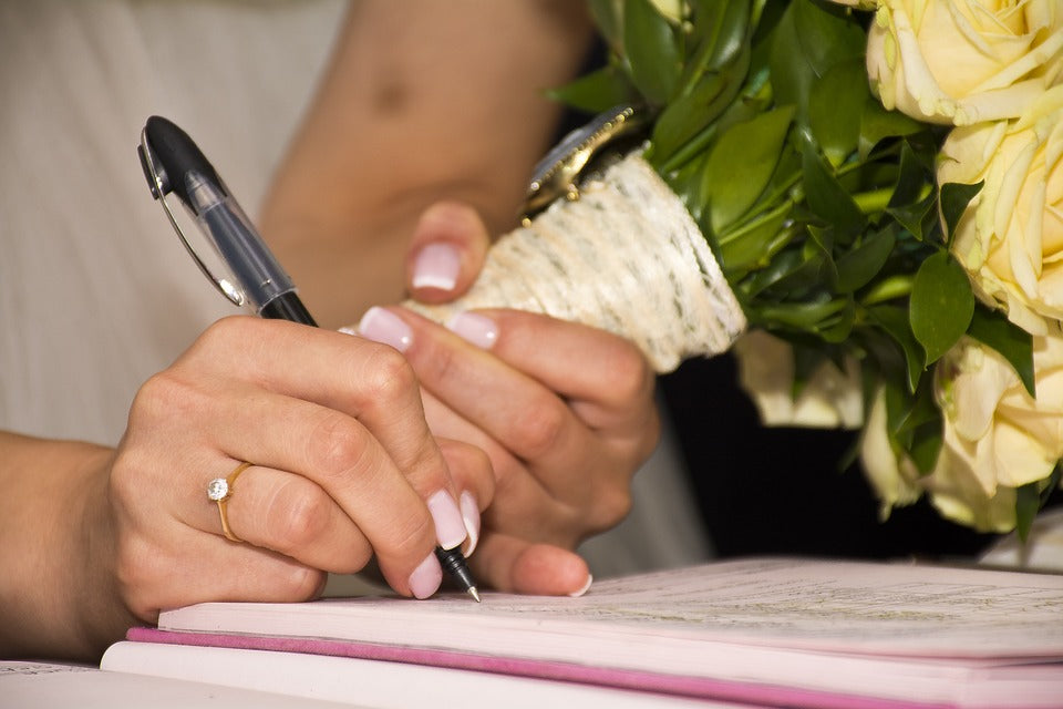 Signing a Marriage Certificate